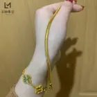 AU999 24K Gold Snake Bone Bracelet for Women: Exquisite Elegance Wrapped Around Your Wrist 5